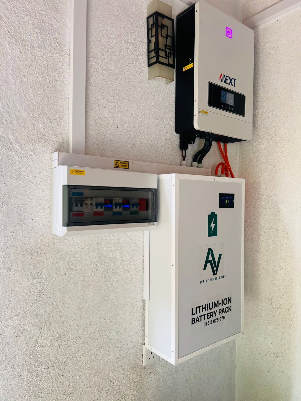 Highlighted Avrio project with NEXT inverter, protection board, and wall-mounted lithium battery pack