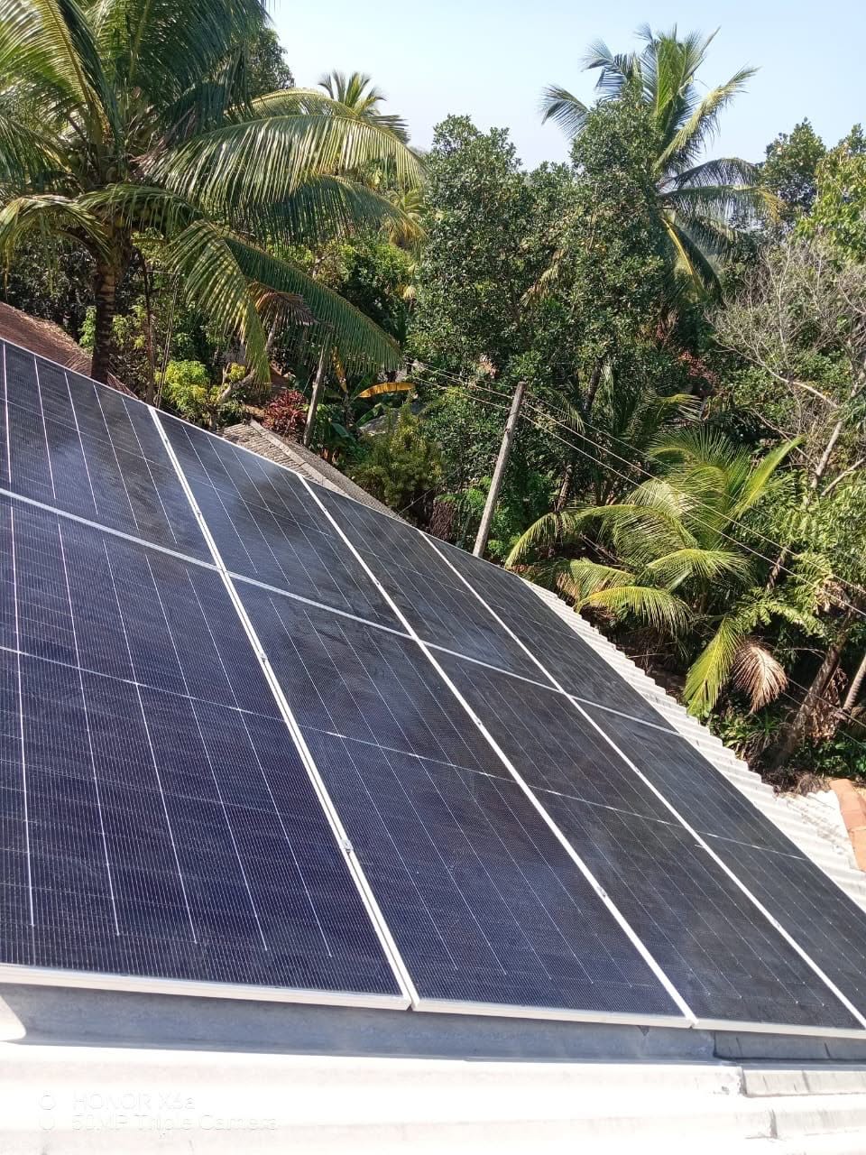 Close-up rooftop solar PV array project by Avrio Technologies